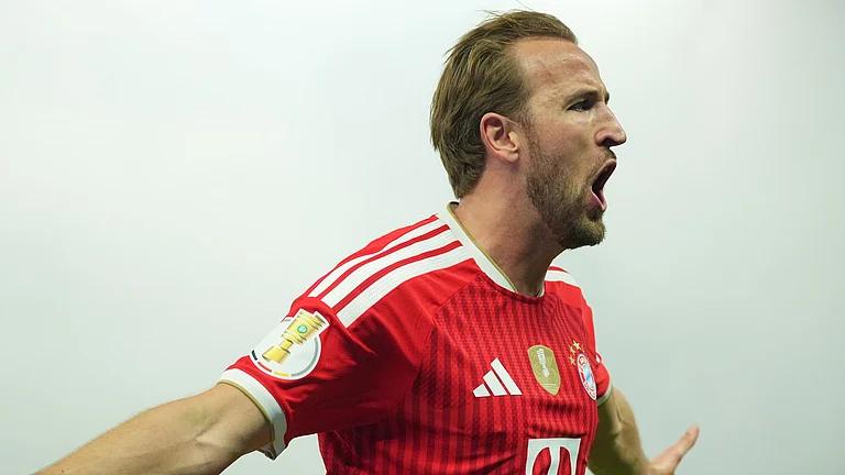 Bayern's Harry Kane celebrates after scoring during the German Cup final soccer match between VfB Stuttgart and Bayern Munich in Berlin, Germany. - AP Photo