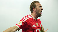 AP Photo : Bayern's Harry Kane celebrates after scoring during the German Cup final soccer match between VfB Stuttgart and Bayern Munich in Berlin, Germany.