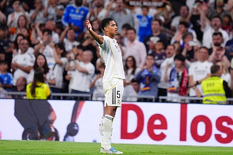 Real Madrid's Jude Bellingham celebrates after scoring during a La Liga soccer match between Real Madrid and Athletic in Madrid, Spain.