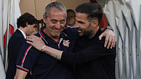 (Alberto Mariani/LaPresse via AP) : Cremonese's head coach Davide Nicola and Como's head coach Cesc Fabregas, right, greet each other ahead of the Serie A soccer match between Cremonese and Como in Cremona Italy, Sunday, May 24, 2026