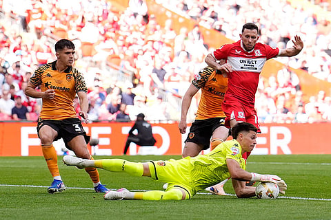 Hull City goalkeeper Ivor Pandur saves at the feet of Middlesbrough's Alan Browne, right, during the Championship play-off final between Hull City and Middlesbrough at Wembley Stadium, London.