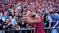 Premier League Highlights, Final Day Goal Rush: Spurs Relegate West Ham; Salah Bids Liverpool Adieu Photo: AP/Peter Byrne : Mohamed Salah takes a selfie with fans following his final Liverpool appearance in the Premier League match at Anfield, Liverpool, England.