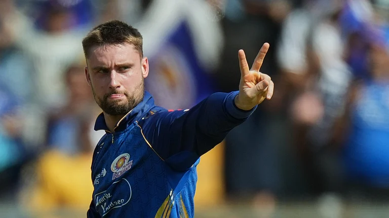 Mumbai Indians' Will Jacks celebrates the wicket of Rajasthan Royals' Yashasvi Jaiswal during the Indian Premier League cricket match between Mumbai Indians and Rajasthan Royals in Mumbai, India, Sunday, May 24, 2026. - AP Photo/Ajit Solanki