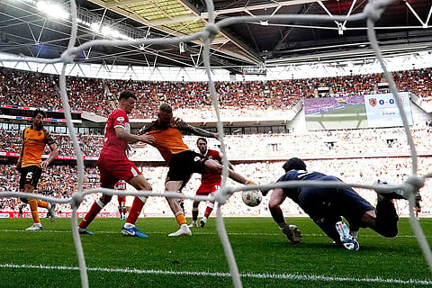 Hull City's Oliver McBurnie scores their side's first goal during the Premier League following the Championship play-off final between Hull City and Middlesbrough at Wembley Stadium, London.