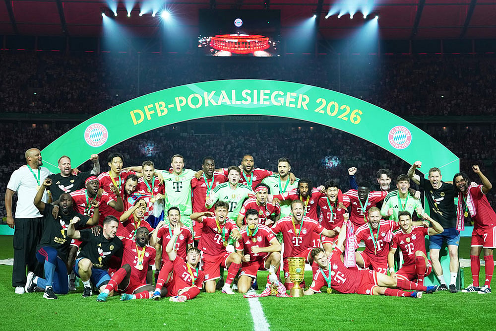 Bayern Munich players celebrate after winning the DFB Pokal, German Cup soccer final between VfB Stuttgart and Bayern Munich in Berlin, Germany. - | Photo: AP/Ebrahim Noroozi