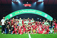 | Photo: AP/Ebrahim Noroozi : Bayern Munich players celebrate after winning the DFB Pokal, German Cup soccer final between VfB Stuttgart and Bayern Munich in Berlin, Germany.
