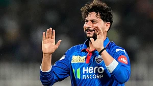 AP Photo/Bikas Das : Delhi Capitals' Kuldeep Yadav celebrates the wicket of Kolkata Knight Riders' Cameron Green during the Indian Premier League cricket match between Delhi Capitals and Kolkata Knight Riders, in Kolkata , India, Sunday, May 24, 2026.