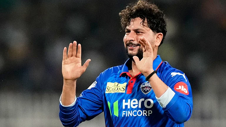 Delhi Capitals' Kuldeep Yadav celebrates the wicket of Kolkata Knight Riders' Cameron Green during the Indian Premier League cricket match between Delhi Capitals and Kolkata Knight Riders, in Kolkata , India, Sunday, May 24, 2026. - AP Photo/Bikas Das