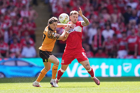 Middlesbrough's Riley McGree, right, and Hull City's Regan Slater battle for the ball during the Championship play-off final between Hull City and Middlesbrough at Wembley Stadium, London.
