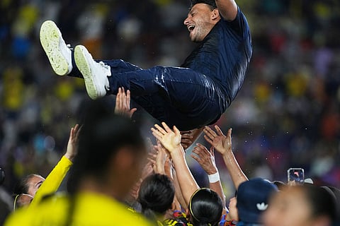 Coach Angel Villacampa of Mexico's America is lifted by his players after winning the Women's CONCACAF Champions Cup final soccer match against The United States' Washington Spirit in Pachuca, Mexico.
