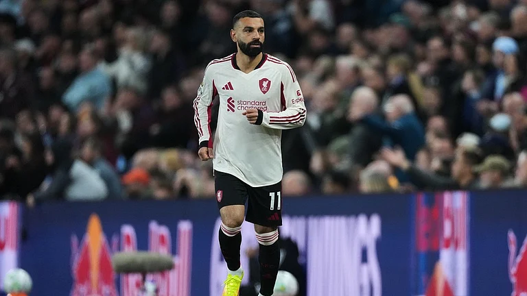 Mohamed Salah runs during the English Premier League match between Aston Villa and Liverpool in Birmingham, England. - Photo: AP/Dave Shopland