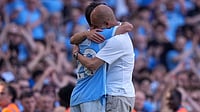Premier League Final Day Wrap: Spurs Survive, West Ham Relegated; Guardiola, Salah Make Tearful Exits AP/Alastair Grant : Manchester City's head coach Pep Guardiola hugs Manchester City's Bernardo Silva as he played his last match for the team during a Premier League match against Aston Villa.