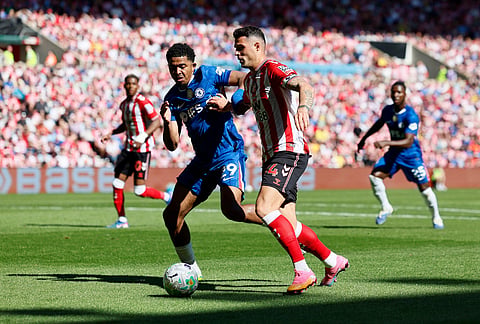 Sunderland's Granit Xhaka, right, and Chelsea's Wesley Fofana, left, battle for the ball during the English Premier League soccer match between Sunderland and Chelsea in Sunderland, England.