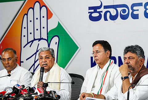 Karnataka Chief Minister Siddaramaiah, second left, addresses a press conference at the KPCC office, in Bengaluru, Karnataka. Karnataka Deputy Chief Minister DK Shivakumar, right, state Health Minister Dinesh Gundu Rao, left, and Congress MP Randeep Singh Surjewala are also seen. 