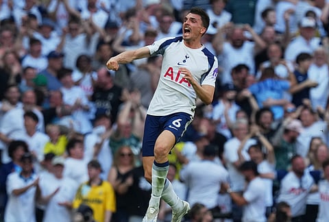 Tottenham's Joao Palhinha celebrates scoring his side's opening goal during the English Premier League soccer match between Tottenham Hotspur and Everton in London, England.