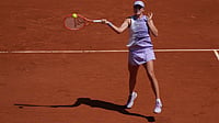 Iga Swiatek Vs Emerson Jones Highlights, French Open: Polish Star Secures Easy Win In Roland-Garros Opener | Photo: AP/Thibault Camus : Iga Swiatek of Poland returns to Emerson Jones of Australia during their first round women’s singles tennis match at the French Open tennis tournament in Paris, Monday, May 25, 2026.