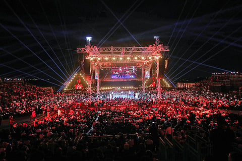 A laser show occurs before a boxing match between Oleksandr Usyk and Rico Verhoeven a head of the WBC World Heavyweight Championship "Glory in Giza" at the site of the Pyramids of Giza, in Giza, Egypt.