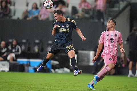 Philadelphia Union defender Frankie Westfield (39) heads the ball as Inter Miami forward Mateo Silvetti (24) looks on during the second half of an MLS soccer match  in Miami.
