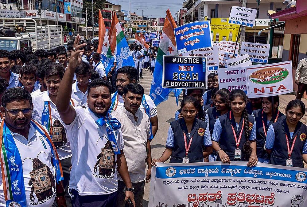 NSUI activists protest against NEET scam in Chikkamagaluru