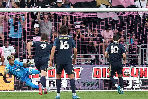 Philadelphia Union forward Milan Iloski (10) scores past Inter Miami goalkeeper Dayne St. Clair (97) on a penalty during the first half of an MLS soccer match in Miami.