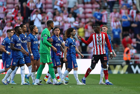 Sunderland's Nordi Mukiele reacts at the Chelsea players the English Premier League soccer match between Sunderland and Chelsea in Sunderland, England.