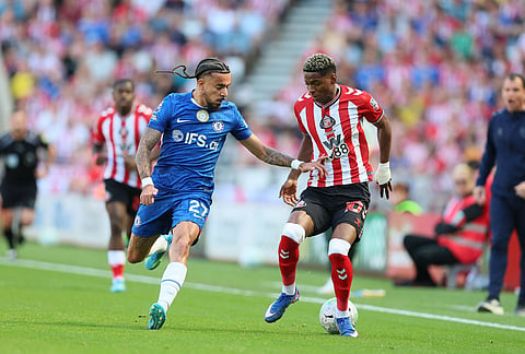 Sunderland's Nilson Angulo and Chelsea's Malo Gusto, left, battle for the ball during the English Premier League soccer match between Sunderland and Chelsea in Sunderland, England.