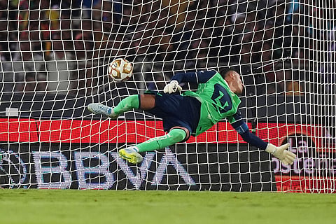 Pumas' goalkeeper Keylor Navas fails to block a shot by Cruz Azul's Rodolfo Rotondi to scores the second goal during the Mexican soccer league second leg final match in Mexico City.
