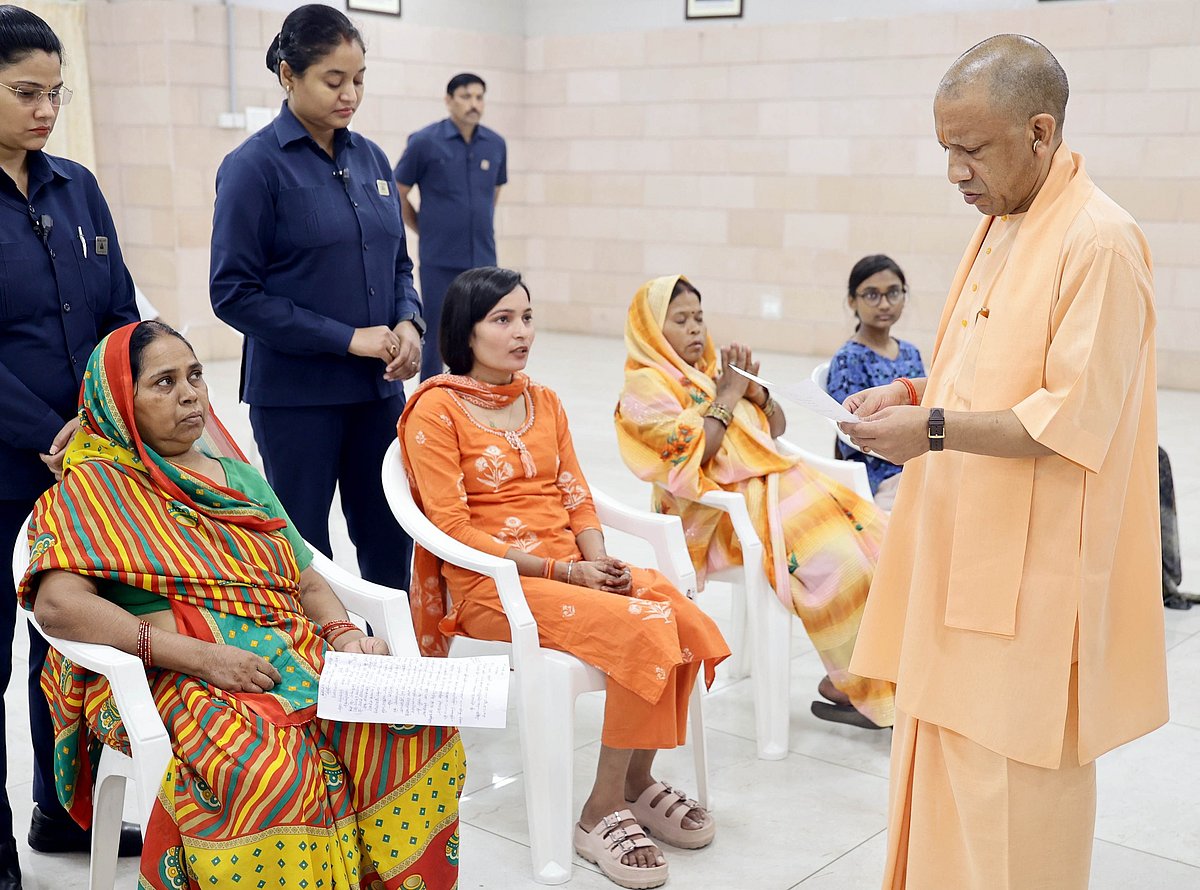 CM Yogi attending to people's grievances at Janta Darshan - null