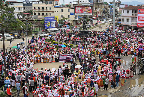 People participate in a protest rally demanding the immediate release of six civilians allegedly held hostage by suspected Kuki militants, in Imphal, Manipur.