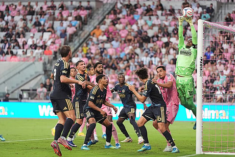 Philadelphia Union goalkeeper Andre Blake (18) deflects a corner kick from Inter Miami forward Lionel Messi during the first half of an MLS soccer match in Miami.
