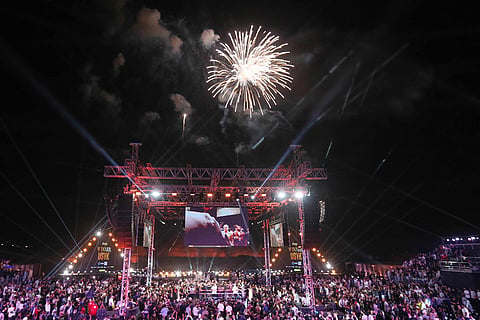 Fireworks explode before a boxing match between Oleksandr Usyk and Rico Verhoeven during the WBC World Heavyweight Championship "Glory in Giza" at the site of the Pyramids of Giza, in Giza, Egypt.