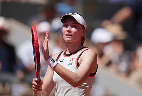 Elena Rybakina of Kazakhstan celebrates winning against Veronika Erjavec of Slovenia during their first round women's singles tennis match at the French Open tennis tournament in Paris.