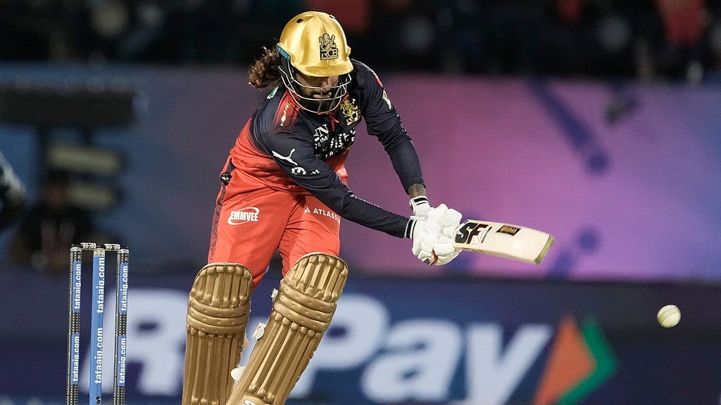 Rajat Patidar plays a shot during the Indian Premier League match between Gujarat Titans and Royal Challengers Bengaluru in Dharamsala. - AP/Ashwini Bhatia