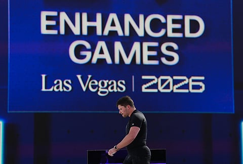 Dylan Cooper, of the United States, leaves the stage after competing in the snatch portion of the men's weightlifting event at the Enhanced Games in Las Vegas.