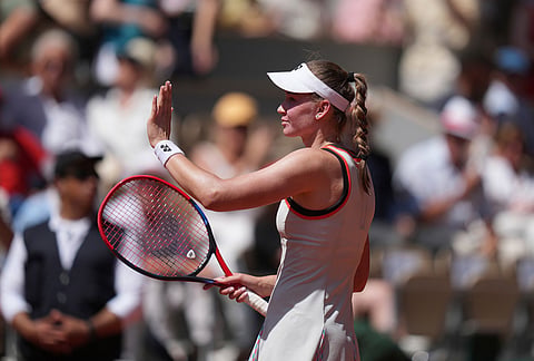 Elena Rybakina of Kazakhstan celebrates winning against Veronika Erjavec of Slovenia during their first round women's singles tennis match at the French Open tennis tournament in Paris.