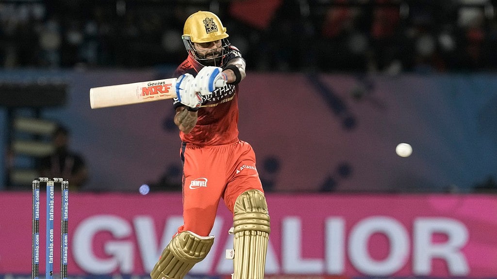 Virat Kohli plays a shot during the Indian Premier League match between Gujarat Titans and Royal Challengers Bengaluru in Dharamsala. - Photo: AP/Ashwini Bhatia