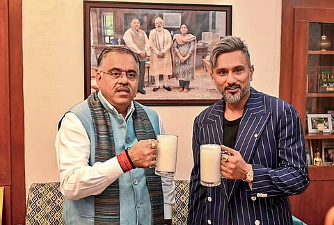 BJP National General Secretary Tarun Chugh, left, during a meeting with singer and music producer Yo Yo Honey Singh on the campaign against drug abuse in Punjab, in New Delhi. 