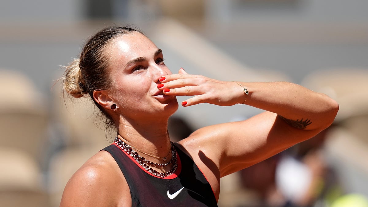 Aryna Sabalenka of Belarus celebrates after winning against Jessica Bouzas Maneiro of Spain during their first round women's singles tennis match at the French Open tennis tournament in Paris. - AP Photo