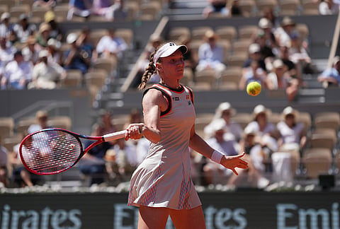Elena Rybakina of Kazakhstan returns to Veronika Erjavec of Slovenia during their first round women's singles tennis match at the French Open tennis tournament in Paris.