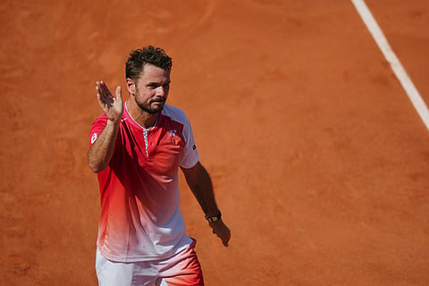 Stan Wawrinka of Switzerland reacts after the first round men's singles tennis match against Jesper De Jong of the Netherlands at the French Open tennis tournament in Paris.