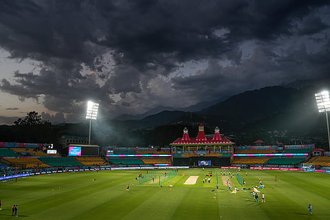 Gujarat Titans' players and Royal Challengers Bengaluru's players during a practice session ahead of an Indian Premier League (IPL) 2026 T20 first qualifier cricket match between Royal Challengers Bengaluru and Gujarat Titans, in Dharamshala, Himachal Pradesh.