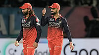 IPL 2026: Sai Sudharsan Holds On To Orange Cap Despite Ugly Hit Wicket, Bhuvneshwar Keeps Purple Cap After Qualifier 1 AP Photo : Royal Challengers Bengaluru's captain Rajat Patidar, left, celebrates with teammate Virat Kohli after taking the catch to dismiss Gujarat Titans' Rahul Tewatia during the Indian Premier League cricket match between Gujarat Titans and Royal Challengers Bengaluru in Dharamshala.