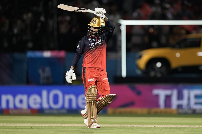 Royal Challengers Bengalurus captain Rajat Patidar celebrates his fifty runs