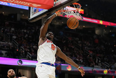 New York Knicks forward Og Anunoby dunks during the second half of Game 4 in the Eastern Conference finals NBA basketball playoffs series against the Cleveland Cavaliers in Cleveland.