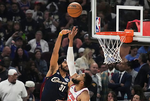 Cleveland Cavaliers center Jarrett Allen (31) shoots against New York Knicks center Karl-Anthony Towns (32) during the second half of Game 4 in the Eastern Conference finals NBA basketball playoffs series in Cleveland.