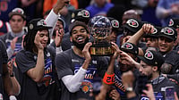AP Photo/Tim Phillis : New York Knicks's Karl-Anthony Towns, center, and teammates celebrate after winning Game 4 in the Eastern Conference finals NBA basketball playoffs series against the Cleveland Cavaliers in Cleveland, Monday, May 25, 2026.