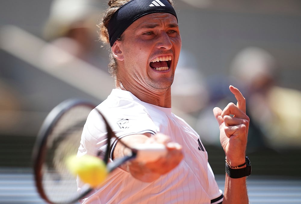 Alexander Zverev of Germany returns to Benjamin Bonzi of France during their first round men's singles tennis match at the French Open tennis tournament in Paris. - | Photo: AP/Christophe Ena