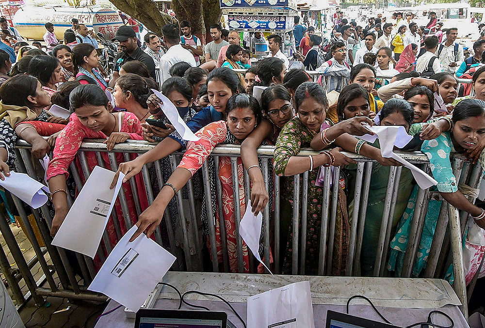 Women job seekers gather at registration counter during Patna job fair