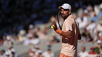 French Open 2026 Day 4 Wrap: Djokovic Pushed To Four Sets Amid Heat Wave; Rybakina Stunned At Roland Garros AP : Novak Djokovic of Serbia reacts as he plays against Valentin Royer of France during their second round men's singles tennis match at the French Open tennis tournament in Paris.