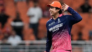 AP/Ashwini Bhatia : Vaibhav Sooryavanshi shares a light moment during the Indian Premier League match between Rajasthan Royals and Sunrisers Hyderabad in New Chandigarh.